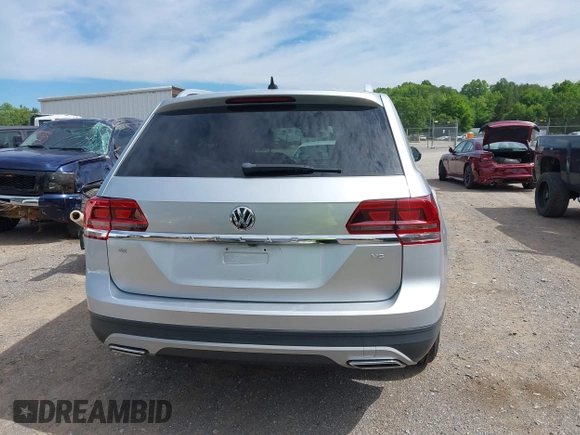 2018 Volkswagen Atlas SE with VIN 1V2DR2CAXJC521412, listed as a IAAI auction lot 42309661 with 99,045 mi miles and . Bid and sale history available at DreamBid. Image 16.
