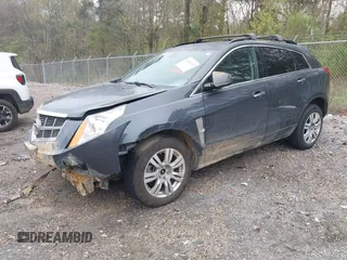 2012 Cadillac SRX with VIN 3GYFNGE31CS640832, listed as a IAAI auction lot 41861023 with 152,138 mi miles. Bid and sale history available at carsss.com. Image 2.