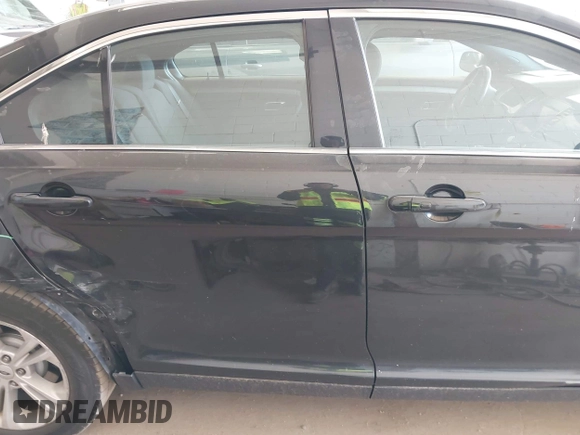 2015 Ford Taurus SEL with VIN 1FAHP2E84FG190092, listed as a IAAI auction lot 42215979 with 187,871 mi miles and . Bid and sale history available at DreamBid. Image 13.