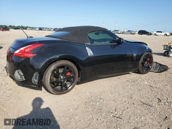 2014 Nissan 370Z Touring with VIN JN1AZ4FH3EM621279, listed as a Copart auction lot 52284814 with 60,479 mi miles and Salvage Title. Bid and sale history available at DreamBid. Image 3.