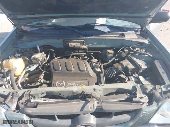 2004 Mazda Tribute ES with VIN 4F2CZ06184KM32333, listed as a IAAI auction lot 42041183 with 33,646 mi miles. Bid and sale history available at carsss.com. Image 10.
