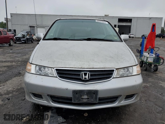 2003 Honda Odyssey EX z VIN 5FNRL18603B008148, wystawiony jako Copart lot #60669825 z przebiegiem 128 115 mil mil oraz Czysty tytuł • Clean title. Historia ofert i sprzedaży dostępna na DreamBid. Obrazek 5.