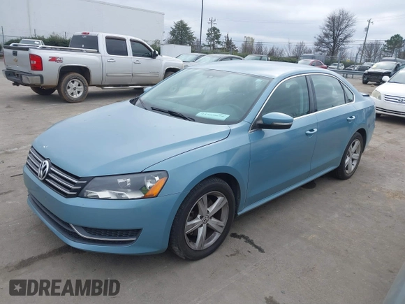 2013 Volkswagen Passat SE w/Sunroof with VIN 1VWBH7A3XDC083442, listed as a IAAI auction lot 41529678 with 138,825 mi miles. Bid and sale history available at carsss.com. Image 2.