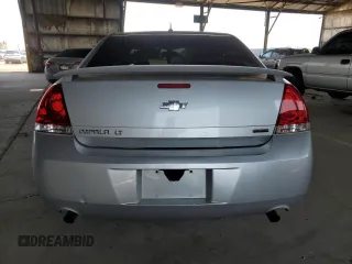 2014 Chevrolet Impala LT with VIN 2G1WB5E3XE1103306, listed as a Copart auction lot 63231005 with 163,901 mi miles and Salvage title. Bid and sale history available at DreamBid. Image 6.