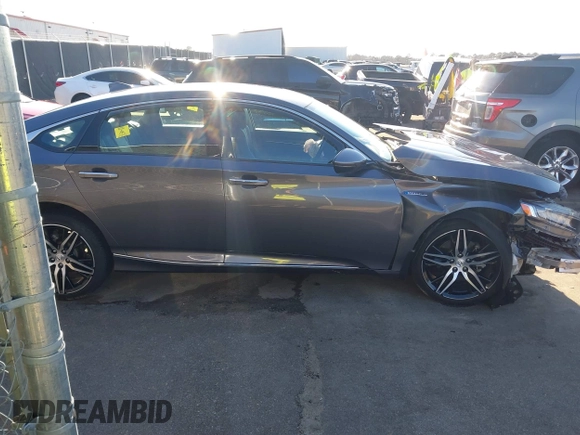 2022 Honda Accord Touring with VIN 1HGCV3F96NA011657, listed as a IAAI auction lot 41701375 with 13,681 mi miles and . Bid and sale history available at DreamBid. Image 13.
