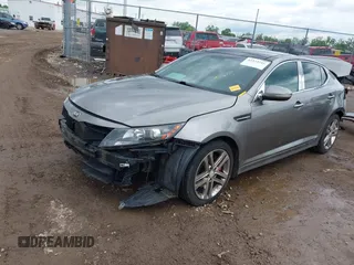 2013 Kia Optima SX z VIN 5XXGR4A65DG120332, wystawiony jako IAAI lot #42323216 z przebiegiem Nie podano mil oraz . Historia ofert i sprzedaży dostępna na DreamBid. Obrazek 17.