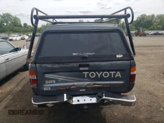 1991 Toyota Pickup DLX z VIN JT4VN13G3M5064161, wystawiony jako Copart lot #57963035 z przebiegiem 232 994 mil mil oraz Szkody całkowita. Historia ofert i sprzedaży dostępna na DreamBid. Obrazek 6.