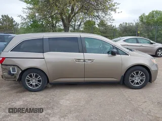 2013 Honda Odyssey EX-L с VIN 5FNRL5H61DB043452, выставлен на аукционе IAAI как лот 42308609 с пробегом 246 866 миль миль и . История ставок и продаж доступна на DreamBid. Изображение 14.