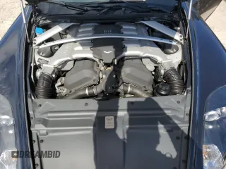 2009 Aston Martin DB9 z VIN SCFAD02E79GB10991, wystawiony jako Copart lot #75089204 z przebiegiem Nie podano mil oraz Szkody całkowita. Historia ofert i sprzedaży dostępna na DreamBid. Obrazek 11.