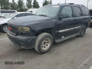 2004 GMC Yukon SLT with VIN 1GKEC13T74R201960, listed as a Copart auction lot 76591114 with 158,498 mi miles and Salvage Title. Bid and sale history available at carsss.com. Image 1.
