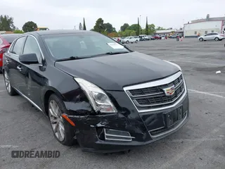 2016 Cadillac XTS Luxury Collection with VIN 2G61M5S30G9185229, listed as a IAAI auction lot 42130274 with 154,021 mi miles and . Bid and sale history available at DreamBid. Image 1.