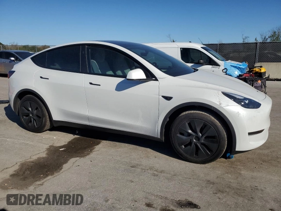 2024 Tesla Model Y with VIN 7SAYGDED3RF130826, listed as a Copart auction lot 47735185 with 10,467 mi miles and Non Repairable. Bid and sale history available at DreamBid. Image 4.