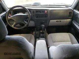 2002 Mitsubishi Montero Sport XLS with VIN JA4MT31R42P007058, listed as a Copart auction lot 41394415 with 0 mi miles and Salvage Title. Bid and sale history available at carsss.com. Image 8.
