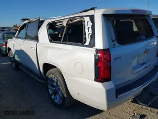 2019 Chevrolet Suburban Premier with VIN 1GNSCJKC0KR293658, listed as a IAAI auction lot 40563834 with 153,619 mi miles. Bid and sale history available at carsss.com. Image 3.