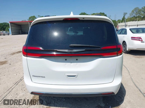 2022 Chrysler Pacifica Touring L with VIN 2C4RC1BG4NR191644, listed as a IAAI auction lot 41979011 with 84,789 mi miles and . Bid and sale history available at DreamBid. Image 16.