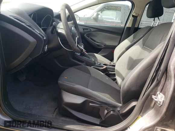 2012 Ford Focus S with VIN 1FAHP3E21CL251788, listed as a Copart auction lot 53663125 with 125,573 mi miles and Salvage Title. Bid and sale history available at DreamBid. Image 7.