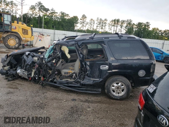2003 GMC Yukon SLT with VIN 1GKEC13Z03R244247, listed as a Copart auction lot 65952894 with 0 mi miles and Salvage Title. Bid and sale history available at carsss.com. Image 2.