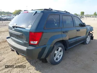 2005 Jeep Grand Cherokee Laredo z VIN 1J4GR48KX5C593240, wystawiony jako IAAI lot #40390746 z przebiegiem 177 646 mil mil oraz . Historia ofert i sprzedaży dostępna na DreamBid. Obrazek 4.