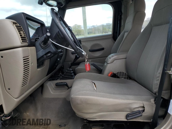 2003 Jeep Wrangler Sahara with VIN 1J4FA59S13P312830, listed as a Copart auction lot 52730955 with 99,247 mi miles and Salvage title. Bid and sale history available at DreamBid. Image 7.
