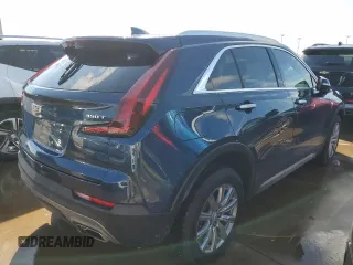 2021 Cadillac XT4 FWD Premium Luxury z VIN 1GYFZCR48MF056210, wystawiony jako Copart lot #73706384 z przebiegiem Nie podano mil oraz Nie do naprawy • Non repairable. Historia ofert i sprzedaży dostępna na DreamBid. Obrazek 3.