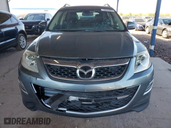 2012 Mazda CX-9 Grand Touring z VIN JM3TB2DA6C0348788, wystawiony jako Copart lot #52444915 z przebiegiem 130 392 mil mil oraz Szkoda całkowita • Salvage title. Historia ofert i sprzedaży dostępna na DreamBid. Obrazek 5.
