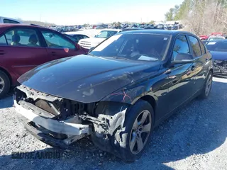 2012 BMW 3 Series 328i with VIN WBA3A5C58CF258408, listed as a IAAI auction lot 41597446 with 227,855 mi miles. Bid and sale history available at carsss.com. Image 2.