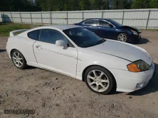 2004 Hyundai Tiburon GT with VIN KMHHN65F84U149299, listed as a Copart auction lot 73946344 with 186,198 mi miles and Non Repairable. Bid and sale history available at carsss.com. Image 4.