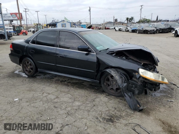 2001 Honda Accord LX z VIN 1HGCG665X1A058192, wystawiony jako Copart lot #57975215 z przebiegiem Nie podano mil oraz Szkoda całkowita • Salvage title. Historia ofert i sprzedaży dostępna na DreamBid. Obrazek 4.