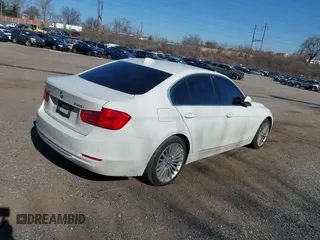 2014 BMW 3 Series 328i xDrive with VIN WBA3B5C59EP540292, listed as a IAAI auction lot 41761916 with 170,819 mi miles. Bid and sale history available at carsss.com. Image 4.