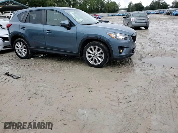 2015 Mazda CX-5 Grand Touring with VIN JM3KE2DY4F0526671, listed as a Copart auction lot 46520505 with 129,017 mi miles and Salvage Title. Bid and sale history available at carsss.com. Image 14.
