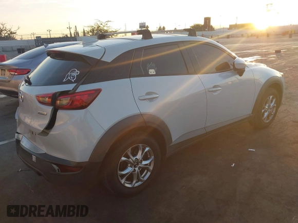 2018 Mazda CX-3 Sport with VIN JM1DKDB72J0305708, listed as a IAAI auction lot 40915983 with 65,324 mi miles. Bid and sale history available at carsss.com. Image 4.