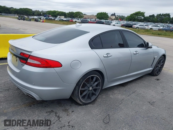 2015 Jaguar XF V6 Portfolio with VIN SAJWA0F79F8U77985, listed as a IAAI auction lot 41386030 with 81,335 mi miles. Bid and sale history available at carsss.com. Image 4.