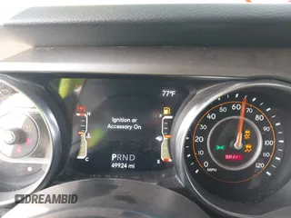 2021 Jeep Gladiator Sport S z VIN 1C6JJTAG9ML538769, wystawiony jako IAAI lot #42078142 z przebiegiem 49 924 mil mil oraz . Historia ofert i sprzedaży dostępna na DreamBid. Obrazek 7.