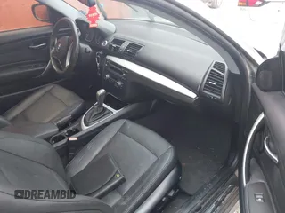 2012 BMW 1 Series 128i with VIN WBAUP9C56CVL90938, listed as a IAAI auction lot 42576072 with 135,234 mi miles and . Bid and sale history available at DreamBid. Image 5.