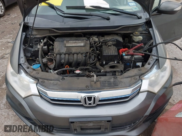 2012 Honda Insight EX with VIN JHMZE2H79CS004299, listed as a IAAI auction lot 42296207 with 170,288 mi miles and . Bid and sale history available at DreamBid. Image 10.