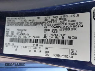 2016 Ford Fiesta ST with VIN 3FADP4GX5GM183254, listed as a IAAI auction lot 41241695 with 61,617 mi miles. Bid and sale history available at carsss.com. Image 9.