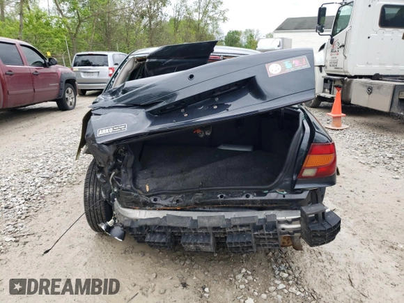 2002 Saturn SL z VIN 1G8ZH52842Z201392, wystawiony jako Copart lot #56595105 z przebiegiem Nie podano mil oraz Szkoda całkowita • Salvage title. Historia ofert i sprzedaży dostępna na DreamBid. Obrazek 6.