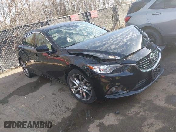 2014 Mazda 6 i Grand Touring with VIN JM1GJ1W66E1162519, listed as a IAAI auction lot 41801957 with 121,586 mi miles. Bid and sale history available at carsss.com. Image 1.