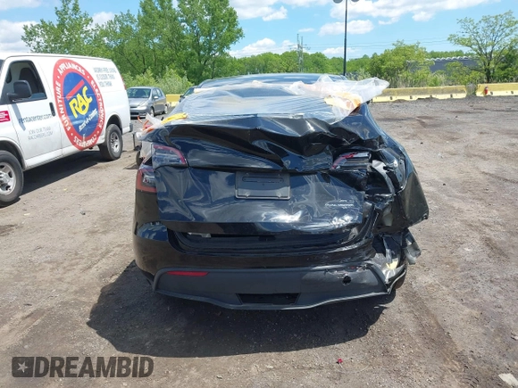 2023 Tesla Model Y Long Range with VIN 7SAYGDEE0PA183891, listed as a IAAI auction lot 42205573 with 41,273 mi miles and . Bid and sale history available at DreamBid. Image 16.