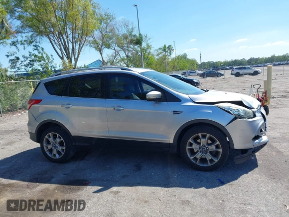 2016 Ford Escape Titanium with VIN 1FMCU0JX2GUC39416, listed as a IAAI auction lot 41793375 with 146,877 mi miles. Bid and sale history available at carsss.com. Image 13.