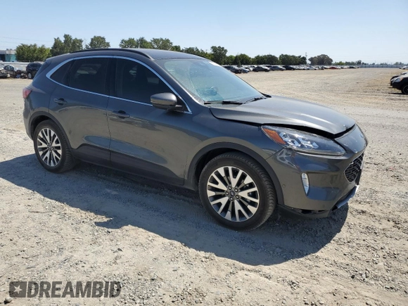 2020 Ford Escape Titanium Hybrid with VIN 1FMCU9DZ4LUA79387, listed as a Copart auction lot 62174835 with 82,486 mi miles and Salvage title. Bid and sale history available at DreamBid. Image 4.