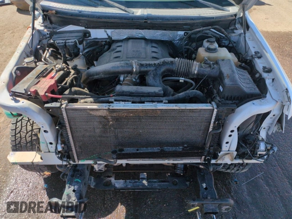 2012 Ford F-150 XL with VIN 1FTFX1ETXCFC98234, listed as a Copart auction lot 49923535 with 150,106 mi miles and Salvage title. Bid and sale history available at DreamBid. Image 11.