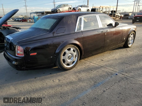 2006 Rolls-Royce Phantom z VIN SCA1S684X6UX08208, wystawiony jako Copart lot #77905764 z przebiegiem 108 986 mil mil oraz Szkody całkowita. Historia ofert i sprzedaży dostępna na DreamBid. Obrazek 3.