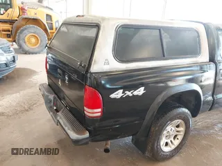 2004 Dodge Dakota Sport with VIN 1D7HG38N24S501391, listed as a IAAI auction lot 41736751 with 213,299 mi miles and . Bid and sale history available at carsss.com. Image 12.