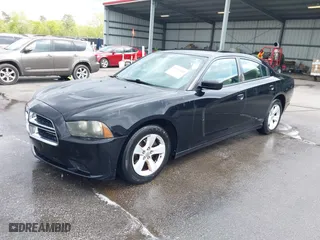 2013 Dodge Charger SE with VIN 2C3CDXBG6DH526840, listed as a IAAI auction lot 41929002 with 273,890 mi miles. Bid and sale history available at carsss.com. Image 2.