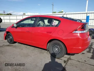 2014 Honda Insight z VIN JHMZE2H36ES001781, wystawiony jako Copart lot #54952395 z przebiegiem 103 911 mil mil oraz Szkoda całkowita • Salvage title. Historia ofert i sprzedaży dostępna na DreamBid. Obrazek 2.