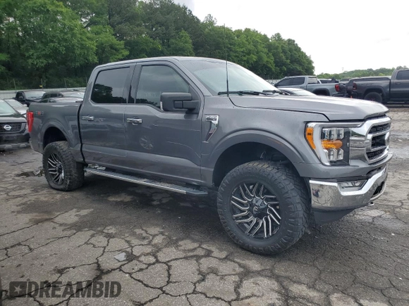 2021 Ford F-150 XL with VIN 1FTEW1EP0MFB98114, listed as a Copart auction lot 55892705 with 47,619 mi miles and Salvage title. Bid and sale history available at DreamBid. Image 4.