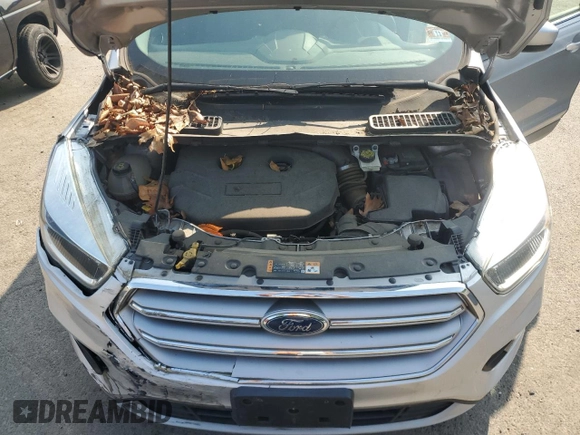 2017 Ford Escape SE z VIN 1FMCU9G99HUF01057, wystawiony jako Copart lot #60351695 z przebiegiem Nie podano mil oraz Czysty tytuł • Clean title. Historia ofert i sprzedaży dostępna na DreamBid. Obrazek 11.