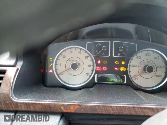 2009 Ford Taurus Limited z VIN 1FAHP25WX9G101791, wystawiony jako Copart lot #56671645 z przebiegiem 120 918 mil mil oraz Nie do naprawy • Non repairable. Historia ofert i sprzedaży dostępna na DreamBid. Obrazek 9.