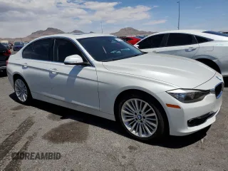 2013 BMW 3 Series 328i z VIN WBA3C1C53DF444720, wystawiony jako Copart lot #54775275 z przebiegiem 71 603 mil mil oraz Szkody całkowita. Historia ofert i sprzedaży dostępna na DreamBid. Obrazek 4.